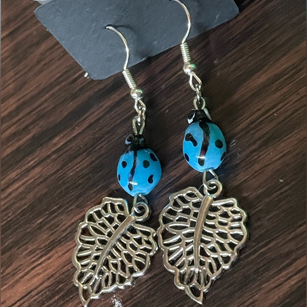 Beautiful glass blue Ladybug Leaf Earrings